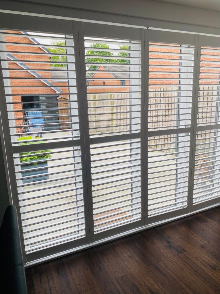 tracked window shutters